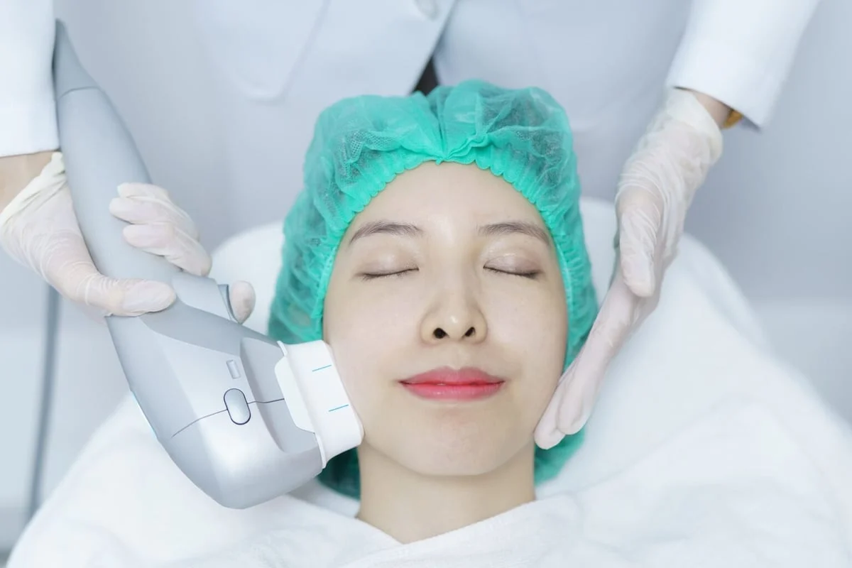 woman enjoying hifu treatment