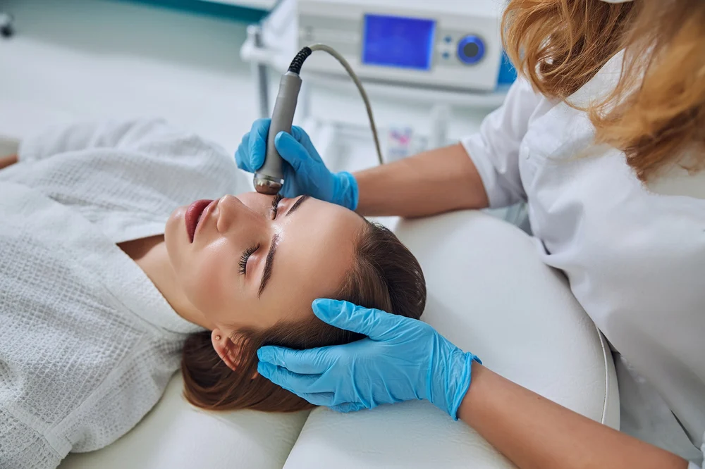 woman receiving skin laser treatment